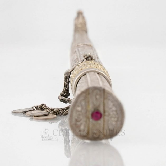 Traditional carved Cretan knife with carved silver case