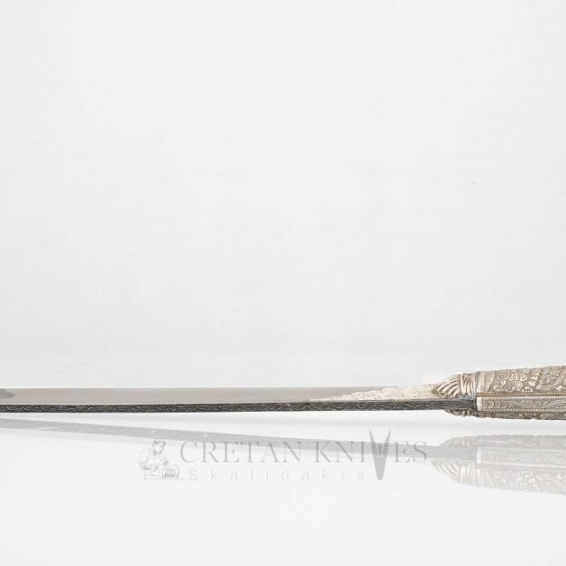 Traditional carved Cretan knife with carved silver case